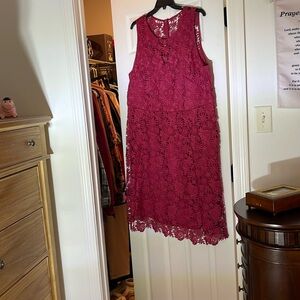 Knee length burgundy sleeveless dress with crochet over lay.
